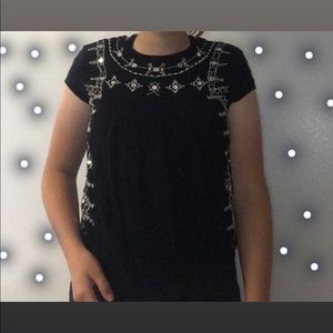 black shirt with white embroidery